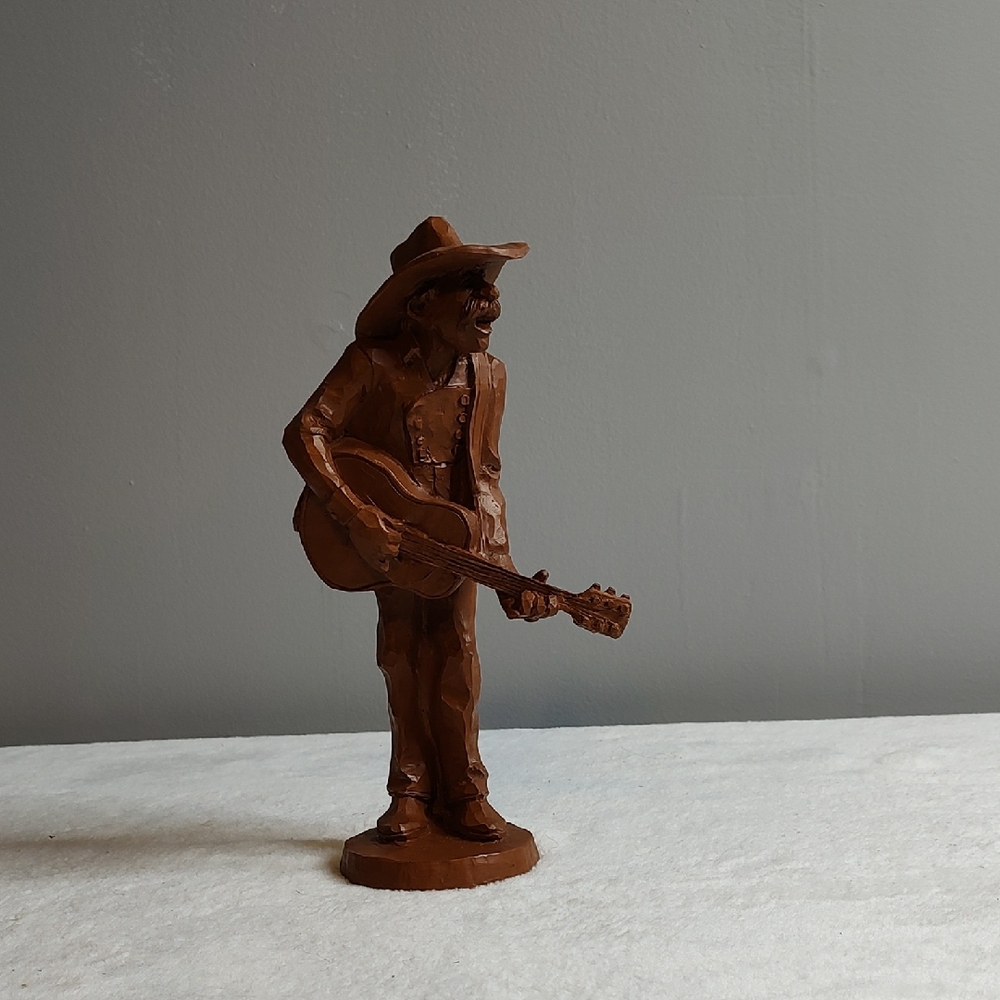 Brown Cowboy Sculpture